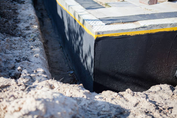 Professional Emergency Waterproofing technician working in Somerset, MD